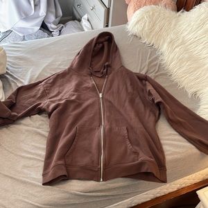 Brown Tillys Zip-up. Bought as large, but now fits like a Medium or Small.